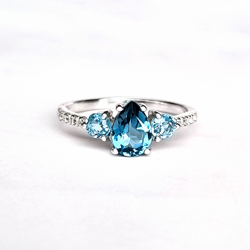 London blue and Swiss blue topaz pear cut ring in sterling silver detail image
