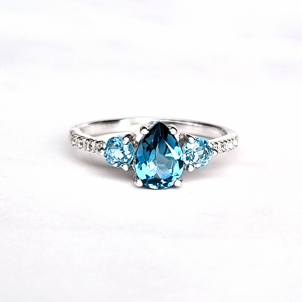 London blue and Swiss blue topaz pear cut ring in sterling silver detail image