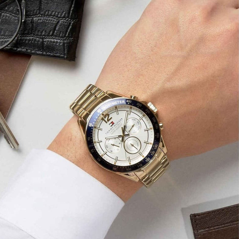 Tommy Hilfiger 1791121 Luke gold watch on wrist
