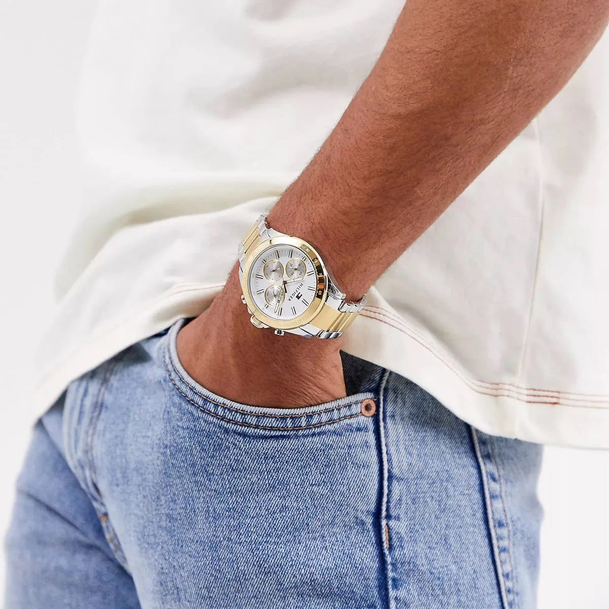 Tommy Hilfiger 1791226 two-tone watch on wrist with white dial