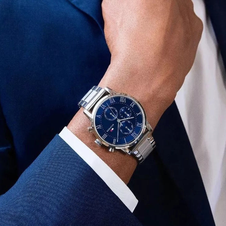 Tommy Hilfiger 1791456 James watch on wrist with grey strap and blue dial