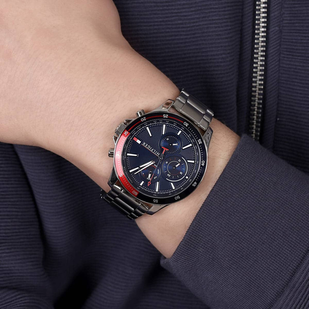 Tommy Hilfiger 1791718 Bank watch on wrist with silver bracelet and blue dial