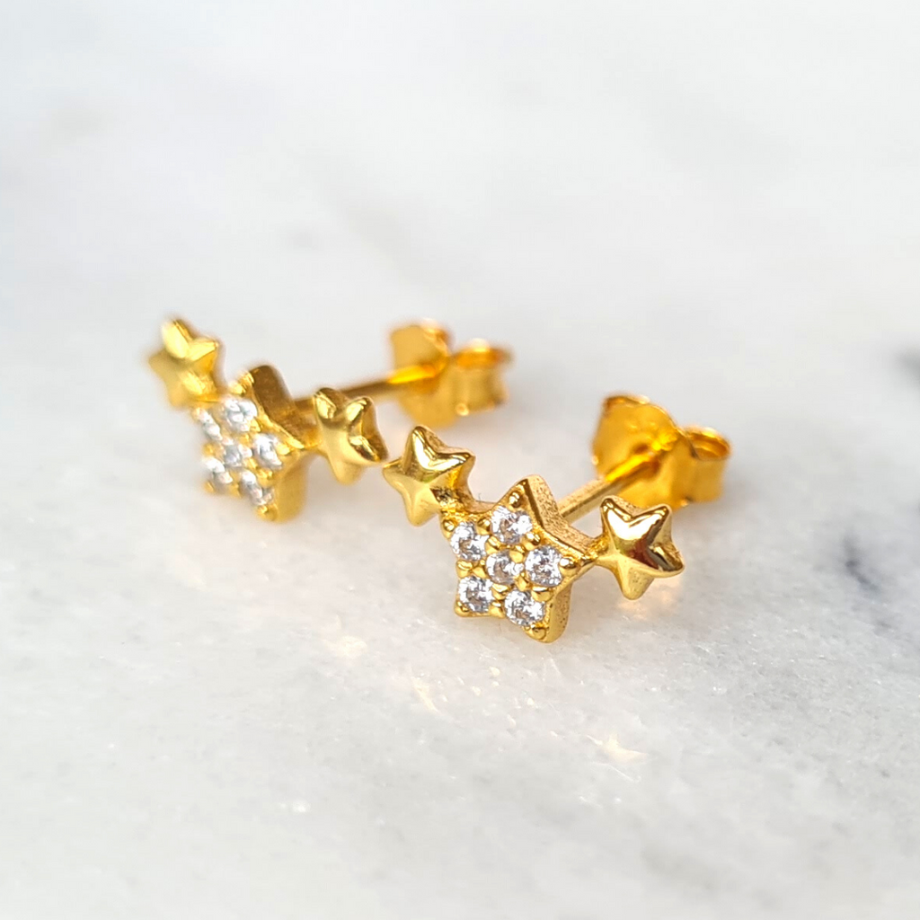 Gold trio of stars earrings product image